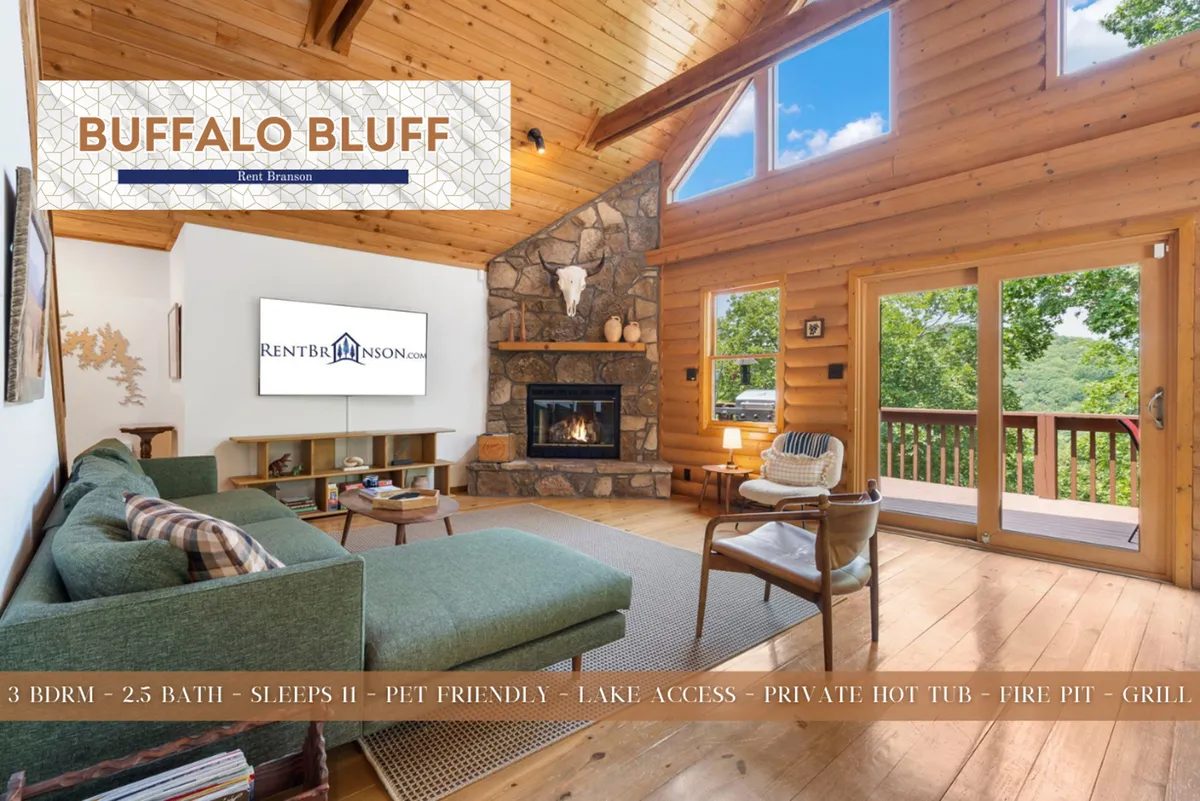 This interior shot highlights a stone fireplace, large windows bringing in natural light, and a comfortable seating area, creating a warm, welcoming environment where guests and their pets can unwind after outdoor explorations.
